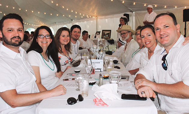 A group of diners at Le Dîner en Blanc to support the Woodbury Heritage Society's efforts to preserve the Miller Barn.