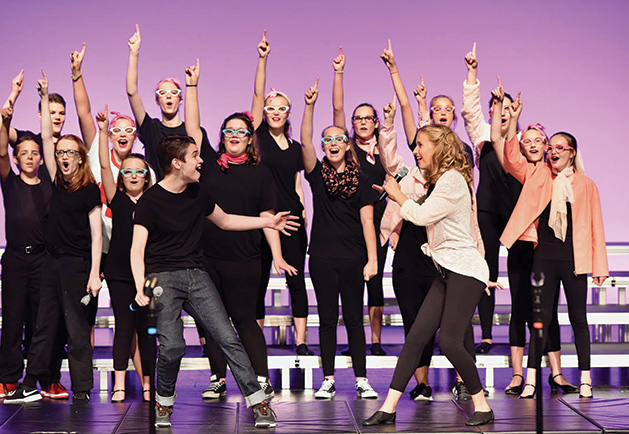 A production of "Grease" by Woodbury Community Theatre at the Merrill Community Arts Center.