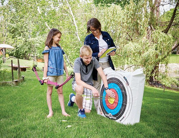 Kim Wilson's kids learn by experiencing unique activities like archery.