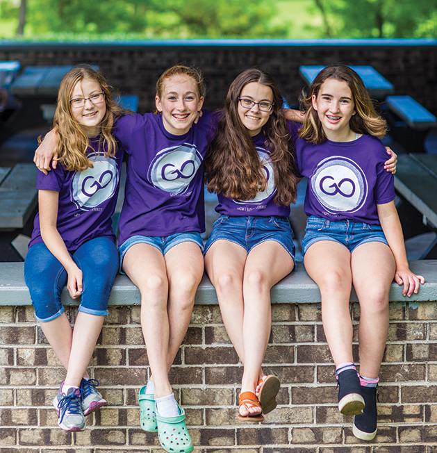 Four girls who participate in GirlOnward, a Woodbury nonprofit focused on giving girls leadership skills.