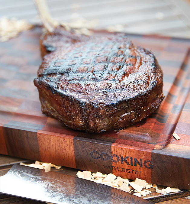 A reverse sear tomahawk steak cooked by Justin Konopaski, aka @cooking_with_justing.