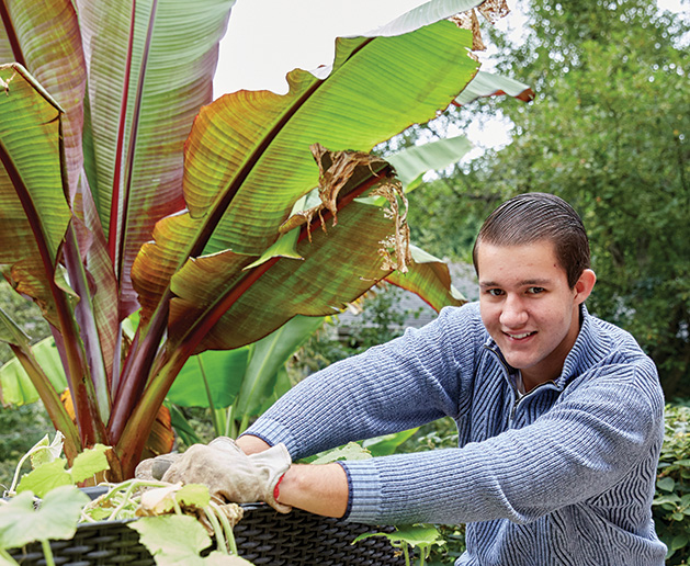 Woodbury gardener Nick Plank tends to his tropical garden.