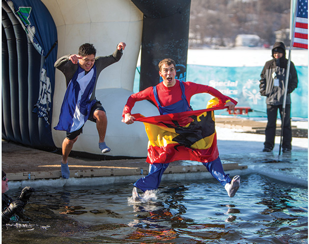Local Photographer Captures the Exhilaration of the Polar Plunge