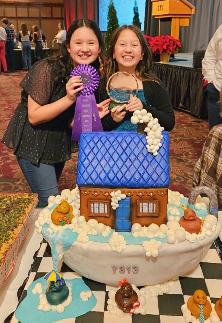 Sisters Emmalyn and Olivias win first place in the youth category.