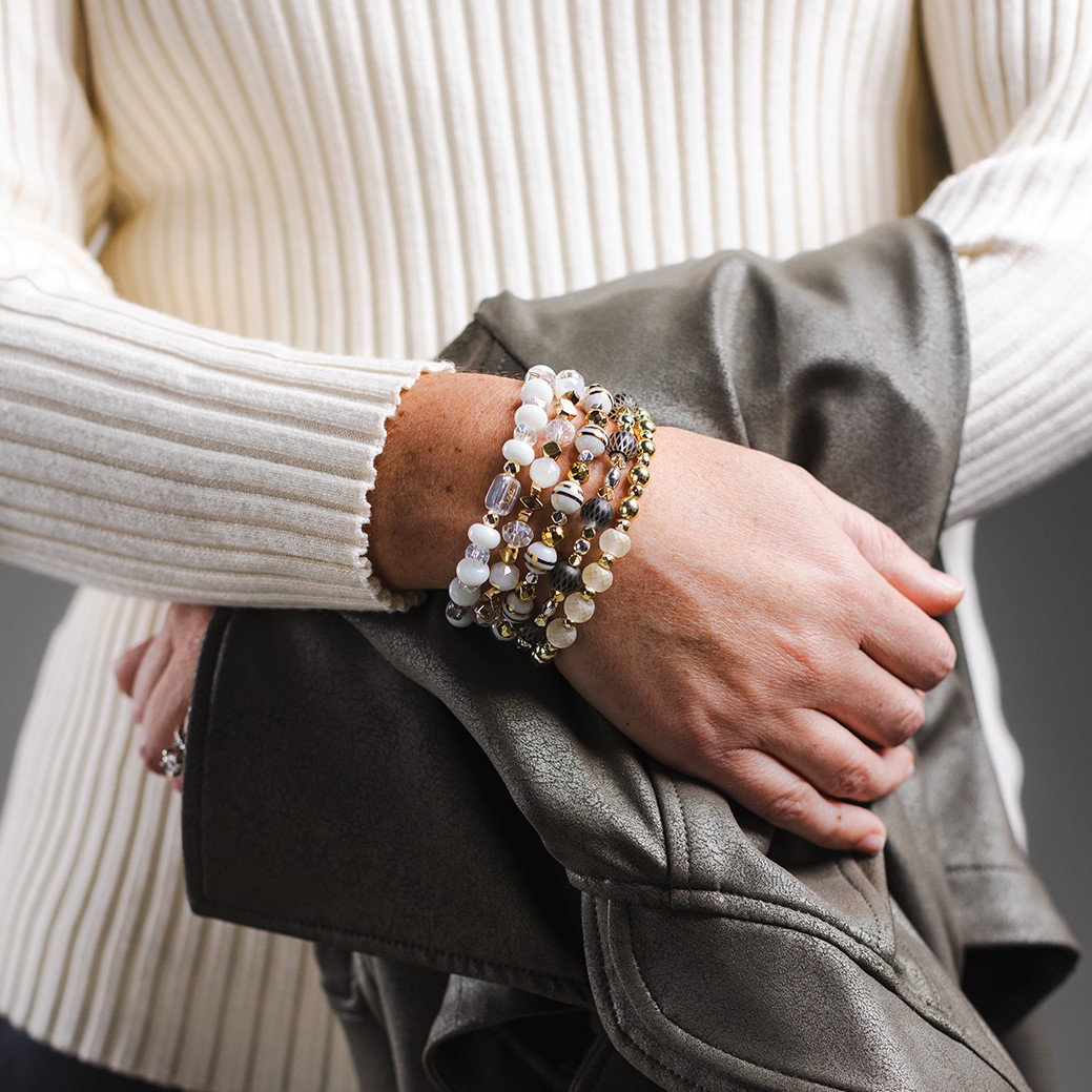 Accessories are queen when it comes to putting together a chic travel look—as seen with Erimish bracelets ($35 for a set of five).