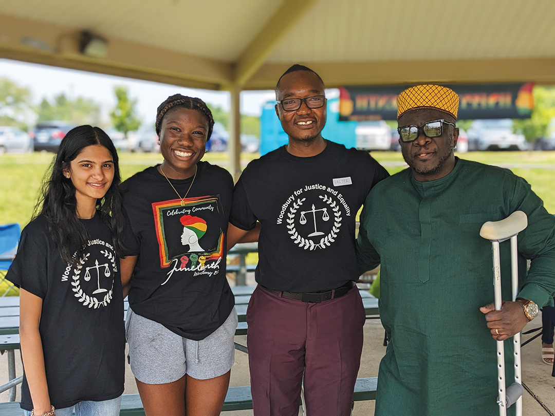 Members of Woodbury for Justice and Equality, including founder Walter Dobgima, celebrate its annual Juneteenth event. 