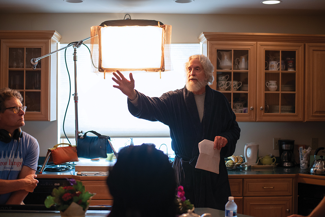 Cristóbal Krusen directing and filming a scene from Let Me Have My Son shows him in the kitchen of Ben Whitmore’s American home.