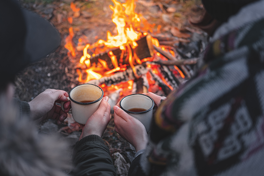 Spending nice time outdoors in chilly weather at a camping place - tranquil and peaceful scene