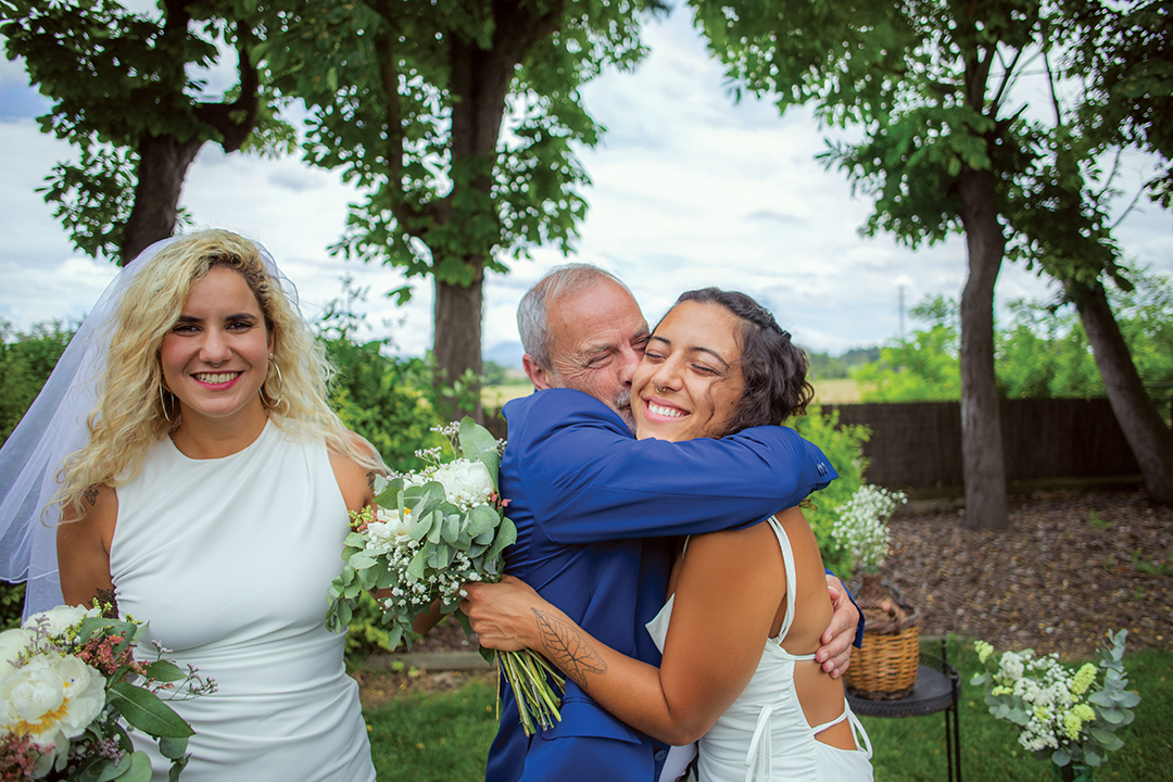 Father Hugging his daughter at her wedding