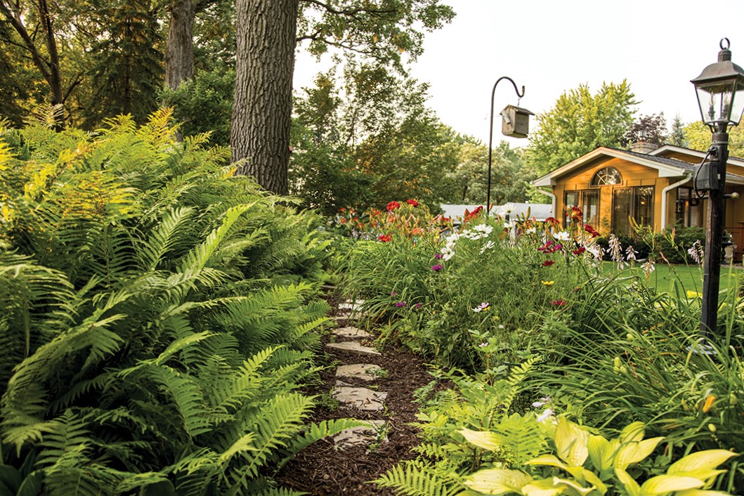 Rod and Eileen Lund’s backyard, situated among the Royal Oaks neighborhood, is a gardeners haven.
