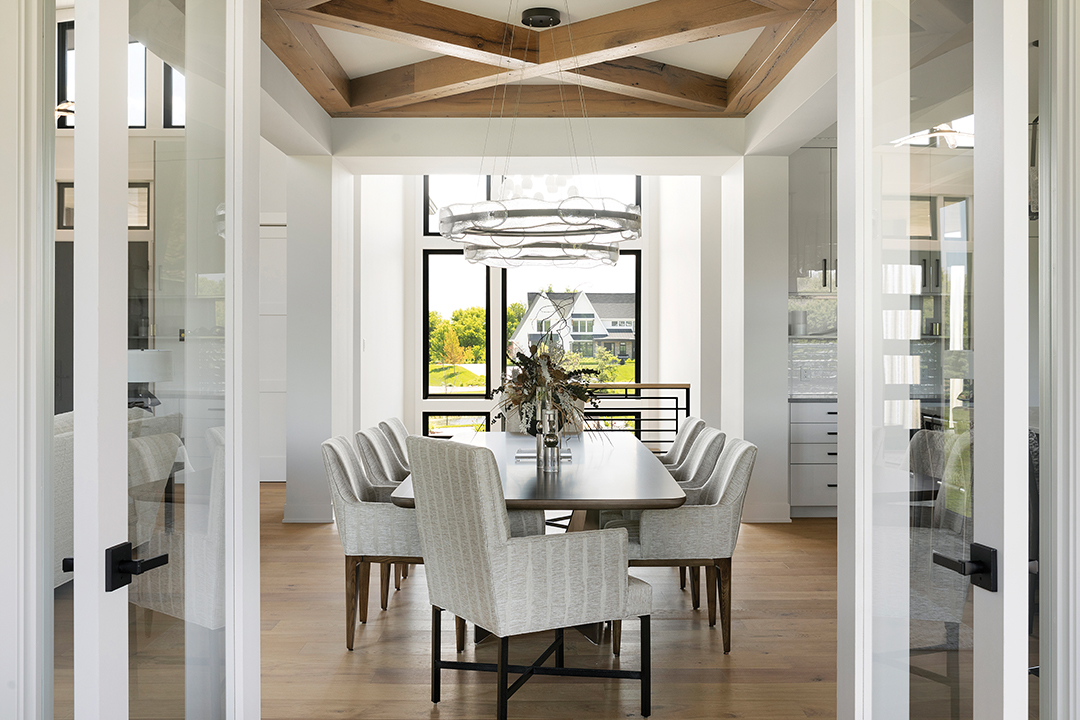 The dining room includes a mix of metals, organic elements and wood.
