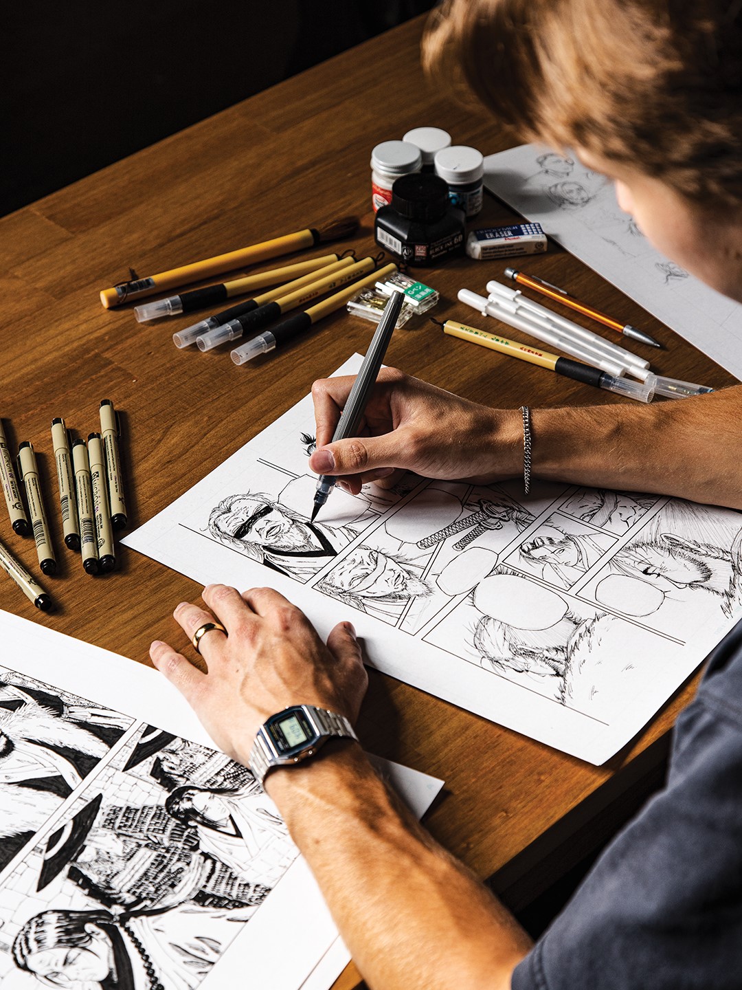 Woodbury High School alumnus Ethan Johnson spends anywhere from four to 35 hours creating one page of his manga.