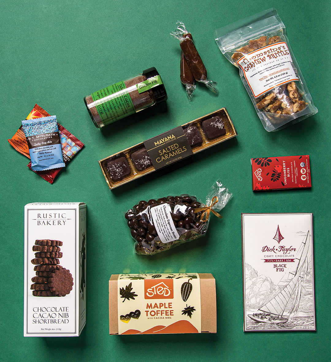 The Chocolate Lovers Gift Box includes BT Bites, chocolate espresso beans, a Dick Taylor Chocolate Bar, Golden Fig Cocoa, maple toffee, Memas Chocolate Sea Salt Caramels, Rustic Bakery cookies, Sted Mini Bars, Thomasina’s Cashew Brittle and Yukon Cocoa.