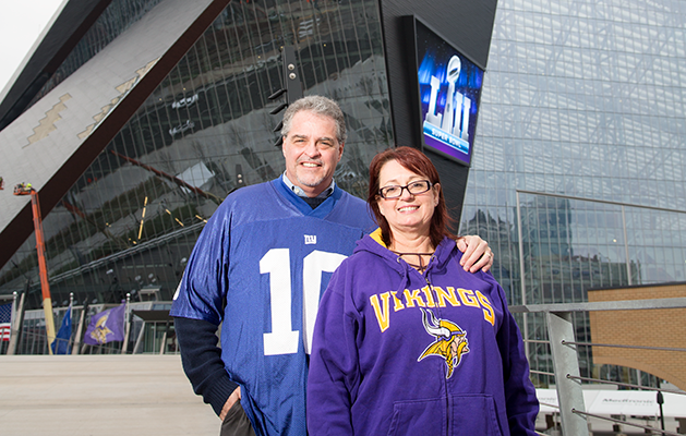 Super Bowl volunteers and football fans Jeanne and Bill Brino.