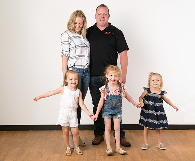Jenny and Steve Virkus have built a home full of love in Woodbury with their daughters (from left), Amelia, Lydia and Sophia.