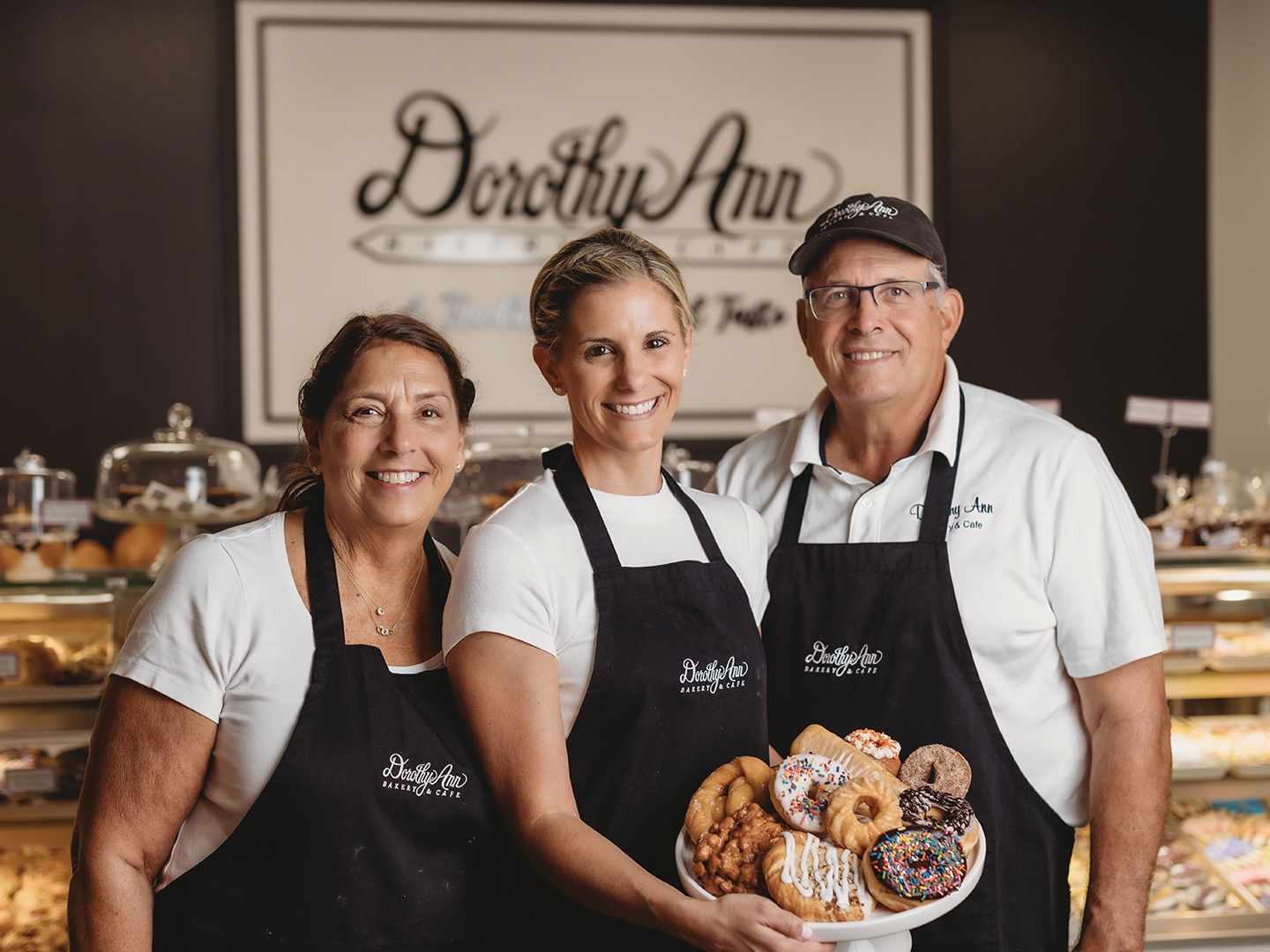 Joan and Steve Conway with daughter Colleen Cicalello (middle).
