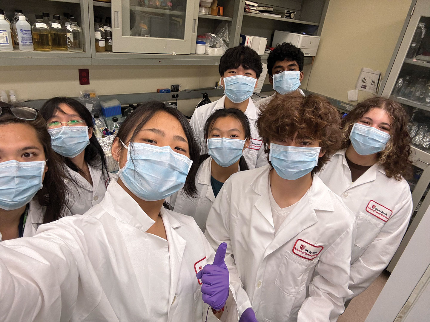 Alyssa Wang with fellow science students