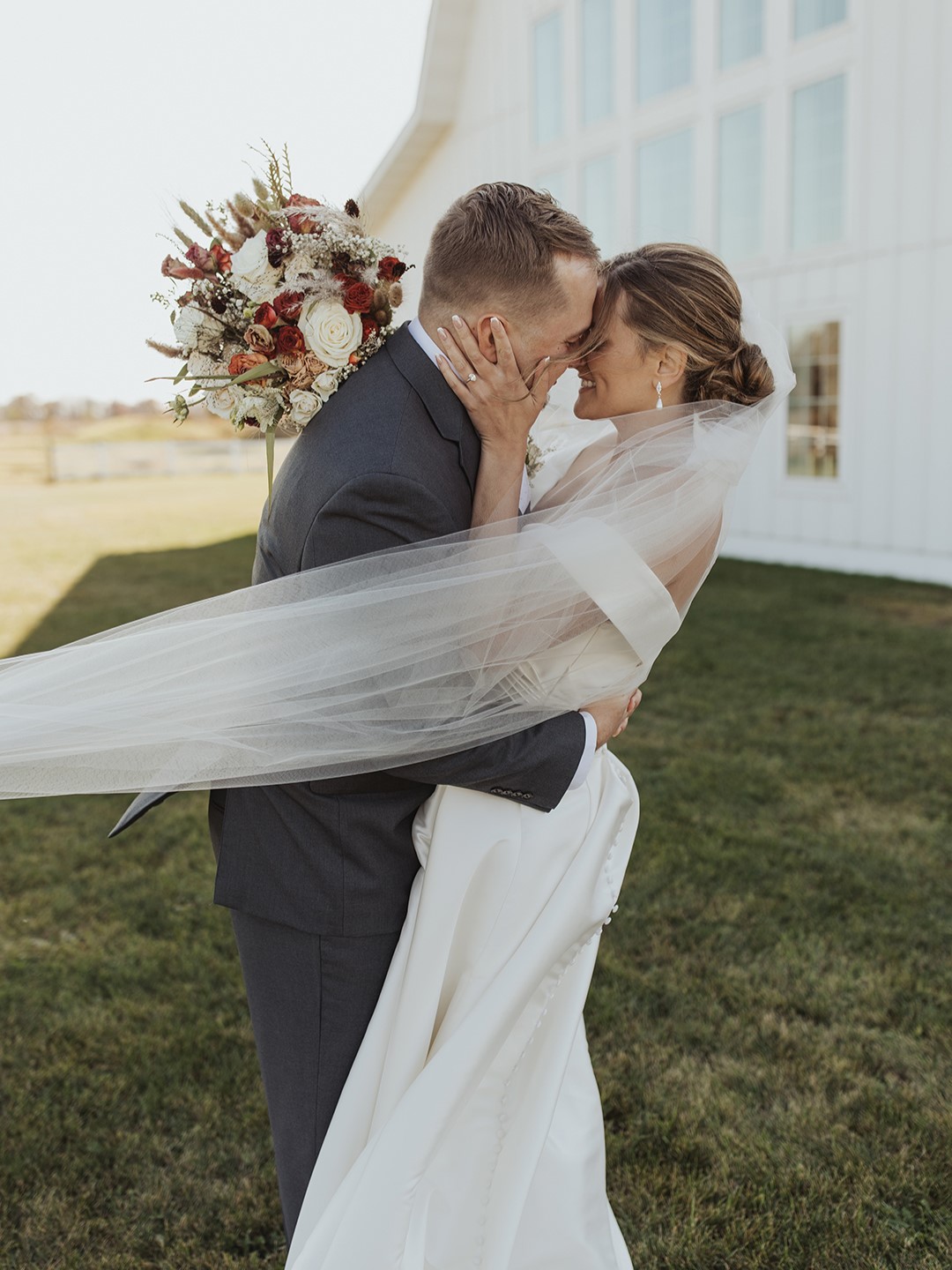 Allie Peterson’s dress was the first she tried on, with a long, billowing veil and minimal accessories. She also wore a claddagh ring representing her heritage and her mother’s garter. Her mother wore a blue dress for Allie’s “something blue,” Allie says. Cole adds, “We don’t like too much flash, but you want something to be kind of personal to you and have a little more texture and depth to it.”