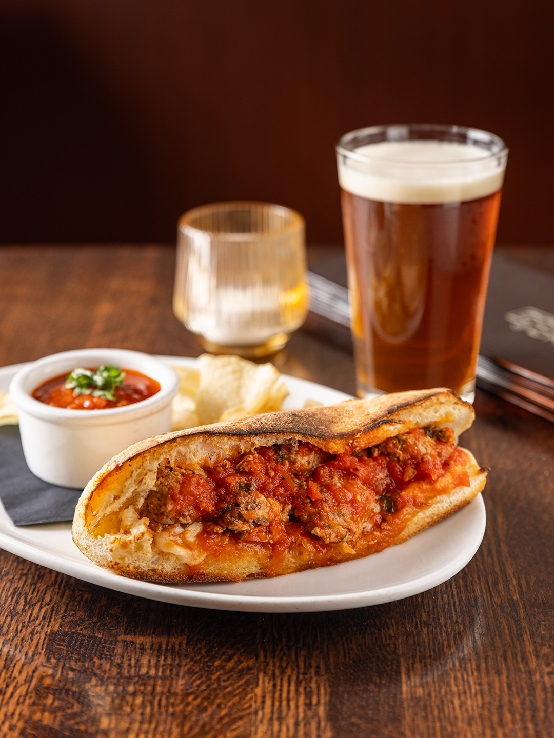 The meatball sandwich features house-made beef and veal meatballs, tomato gravy and Wisconsin mozzarella.
