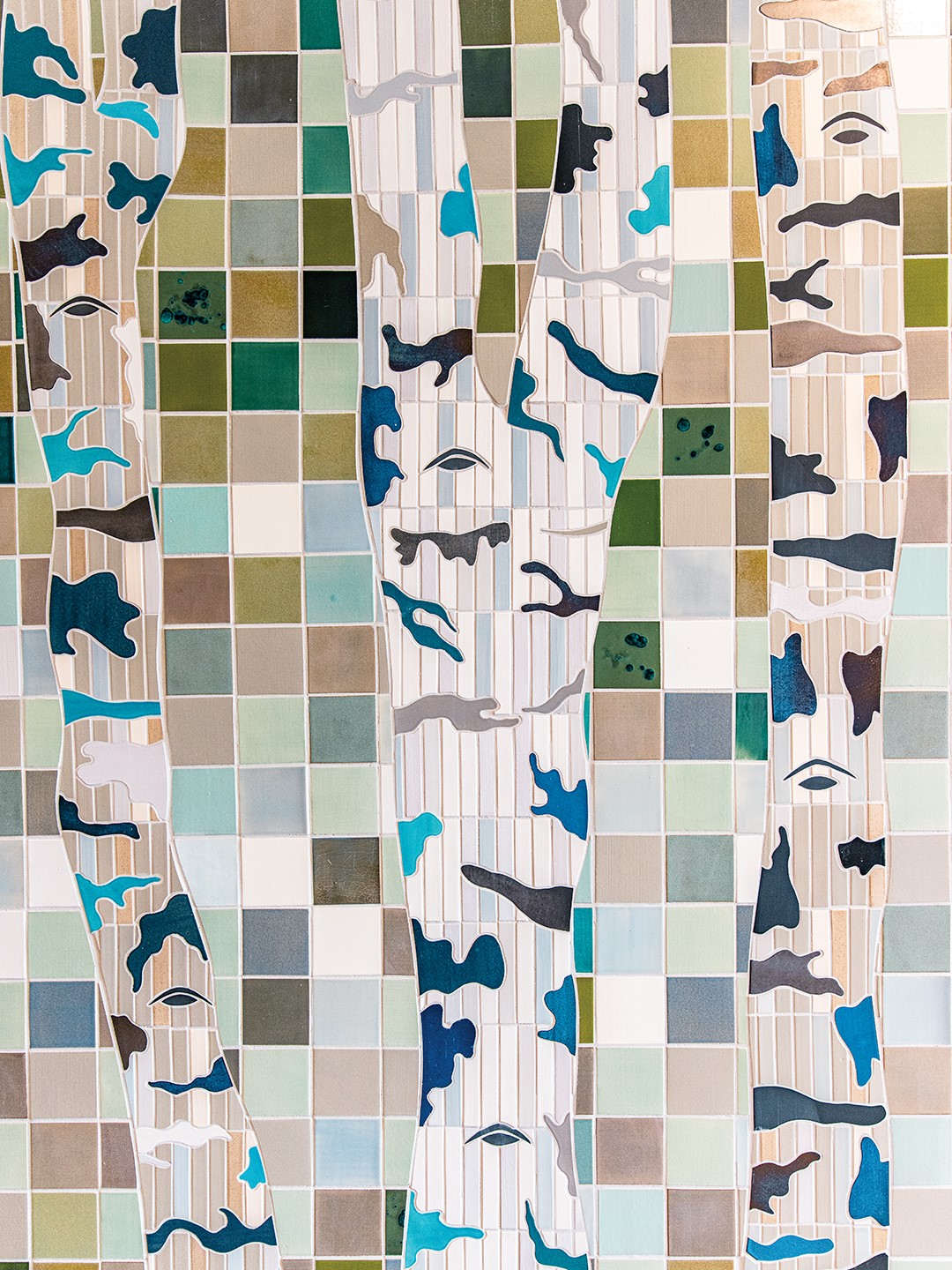 Artist Heather Novak-Peterson was inspired by Minnesota’s birch trees while creating The Watchful Grove, a mosaic mural brought to life by Mercury Mosaics.