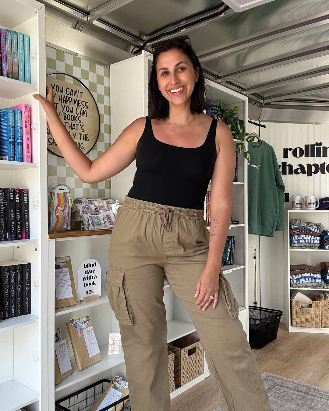Danielle Weber inside the Rolling Chapters mobile bookshop