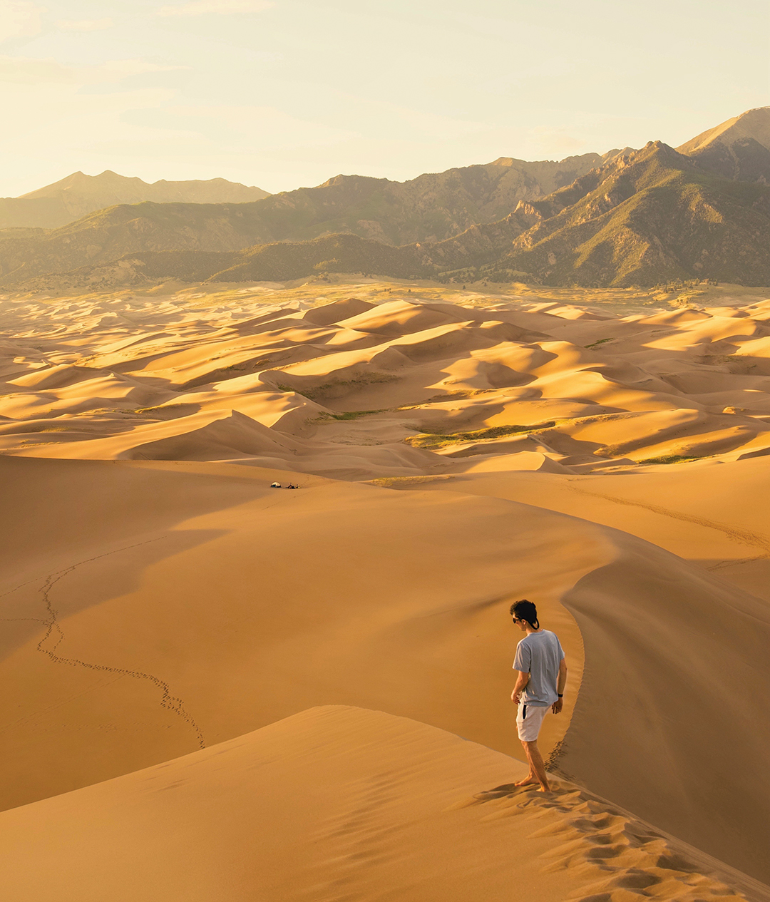 After pitching their tent in Colorado’s Great Sand Dunes National Park last June, Joseph Shoemaker and friends decided to hike up the dunes to watch the sunset. Taken by his friend, Sofia, with his Sony A7IV camera paired with a Sony 28–75mm F2.8 lens.
