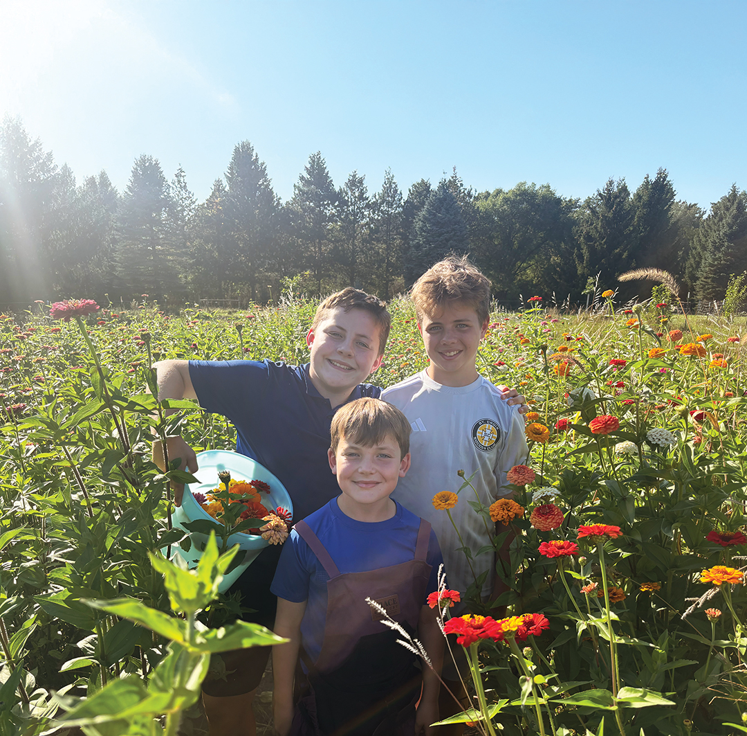 The Heng children, Ollie, 15, Wendel, 13, and Graham, 9, enjoy all aspects of their family business, Jolly Ollie’s Flower & Produce Stand. From July to October, flower bouquets are available for pickup from their stands in Afton and Woodbury.