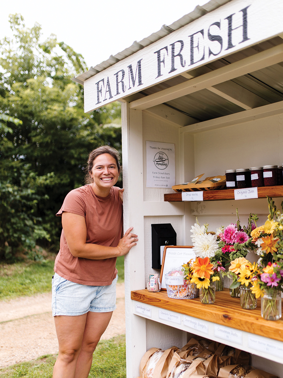 Sarah Olfelt (pictured at left) and her family stock their farm stand with baked goods, cut flower bouquets and more. The stand began in 2024 and is lovingly named Made on Manning as an ode to her Woodbury street.
