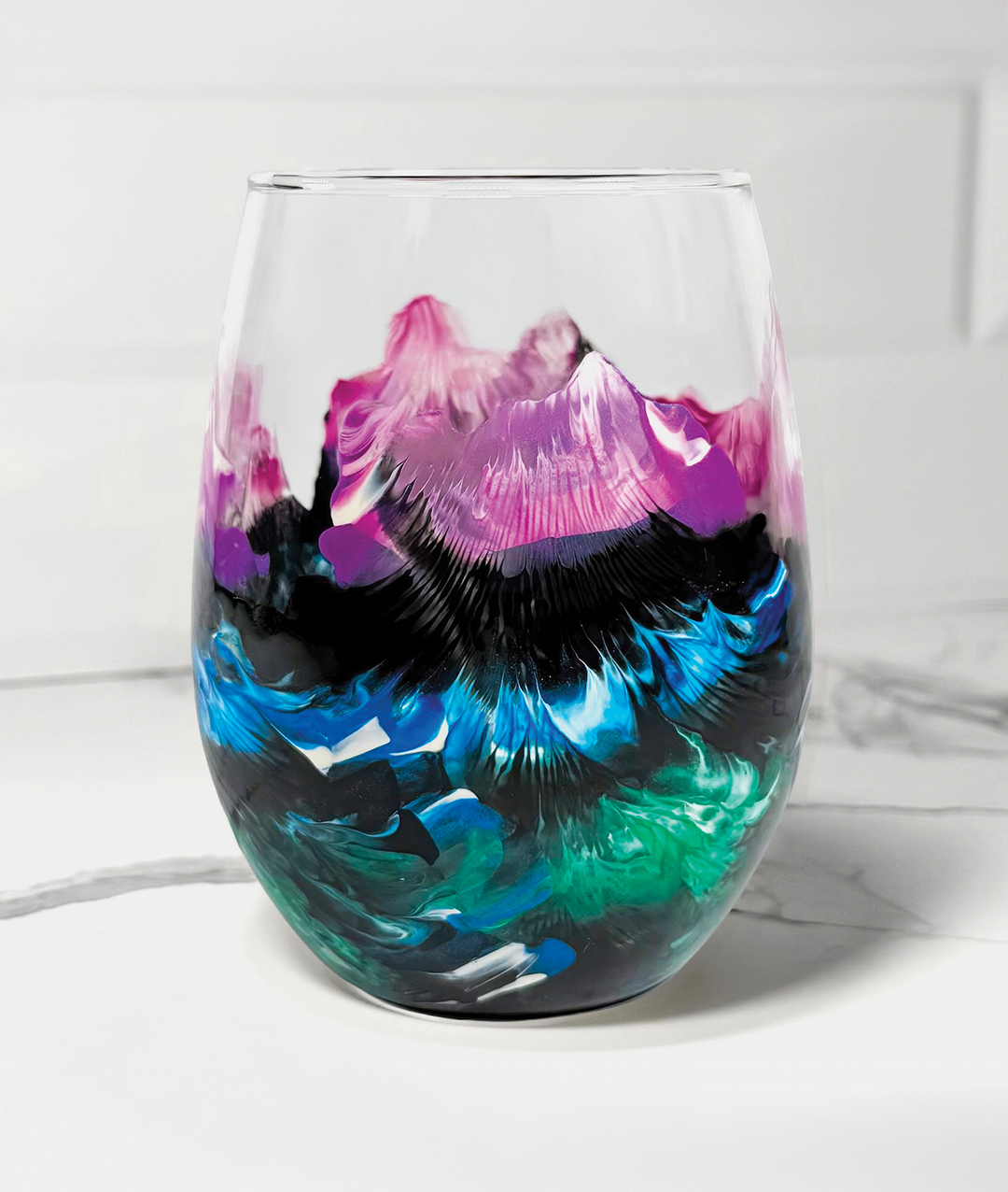 In the midst of COVID-19 lockdowns, Madison Grainger delved into the world of painting—with wine glasses as her canvas. Now, her Northern Lights wine glass, inspired by the aurora borealis, is a bestseller.
