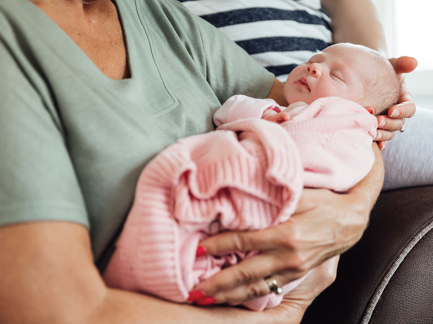 Grandma holding baby girl