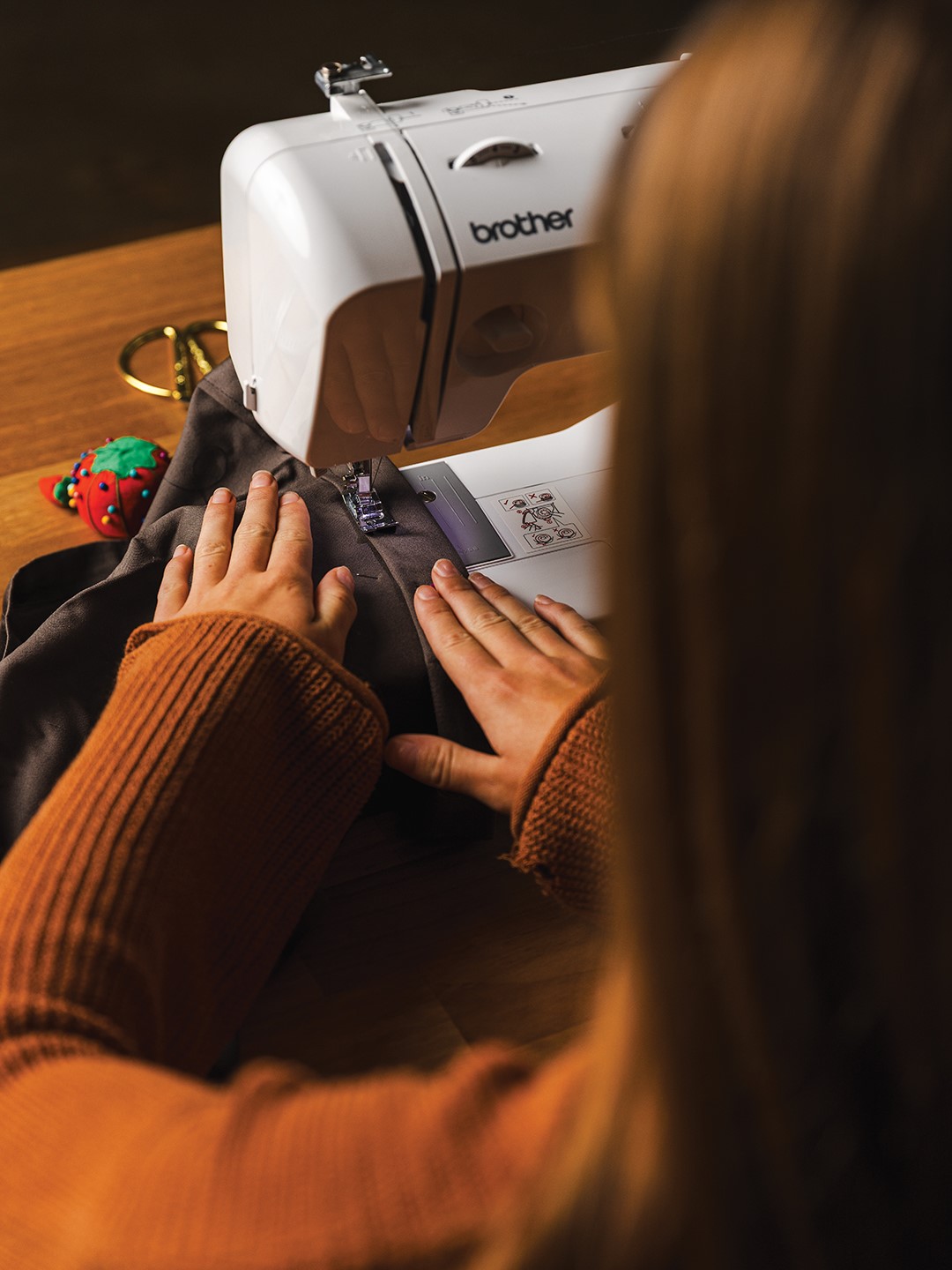 Bella Shields uses her new skills as she takes to the sewing machine.