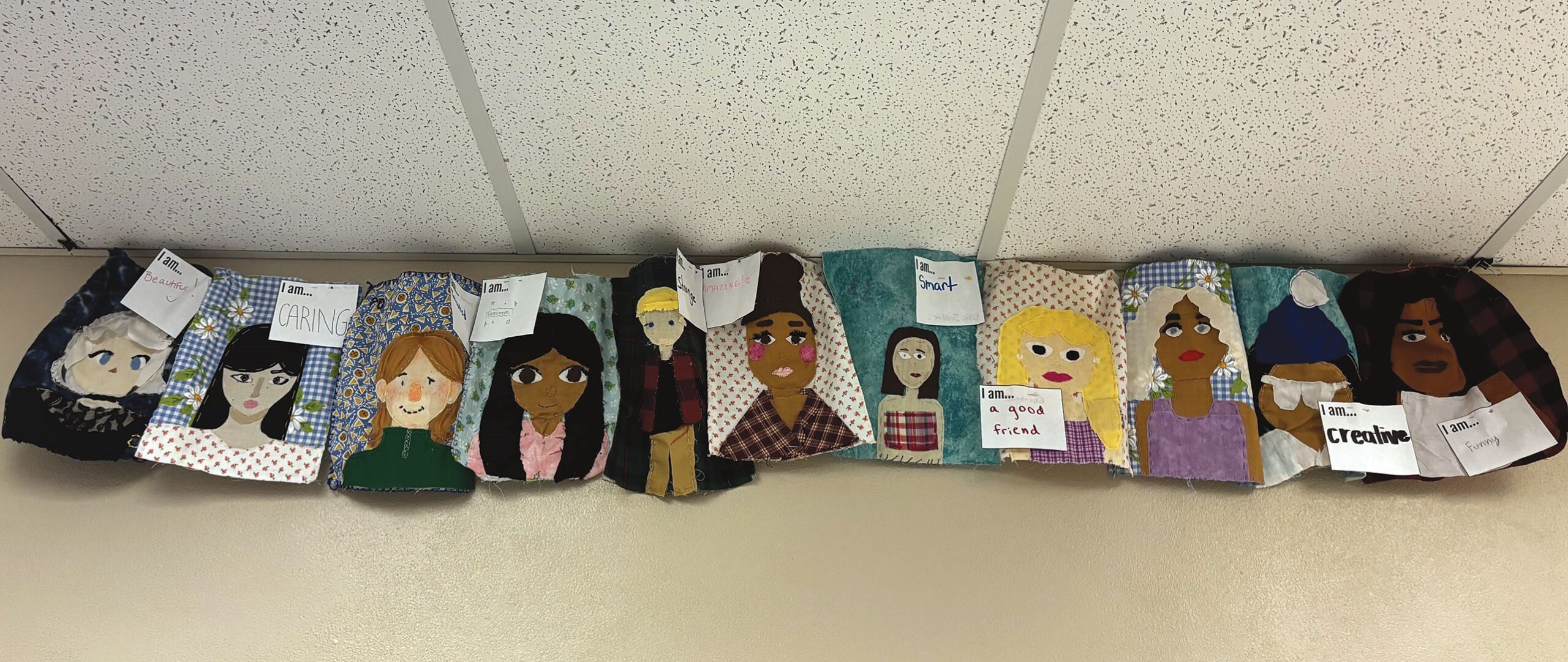 To round out the semester, Woodbury High School students sew self portraits. One year, students were required to share an affirmation about themselves alongside the project.